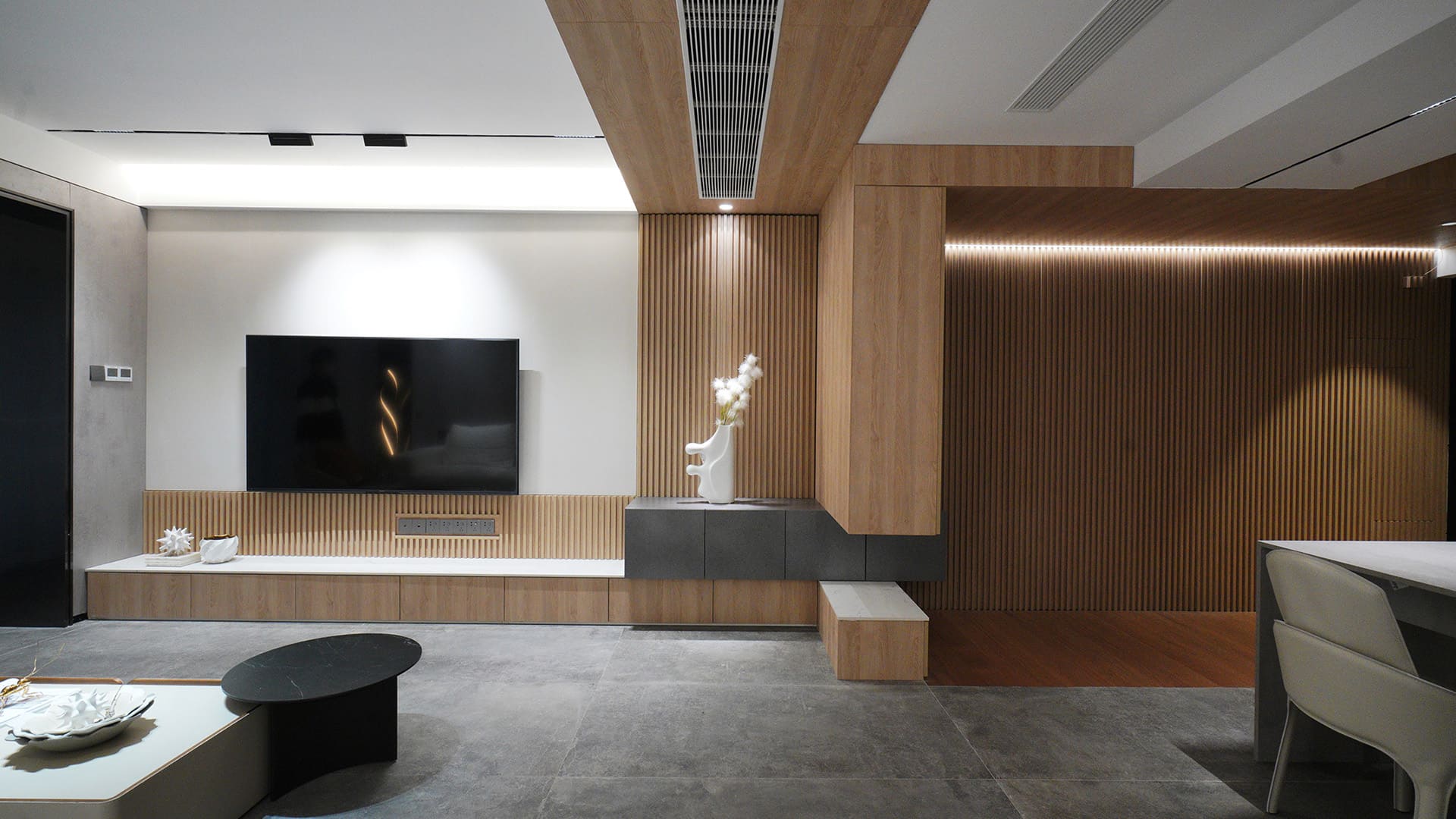 The TV background uses Egger W1000 ST9 Supreme White laser edge banding and H3309 ST29 Sand Yellow Gladstone Oak grille