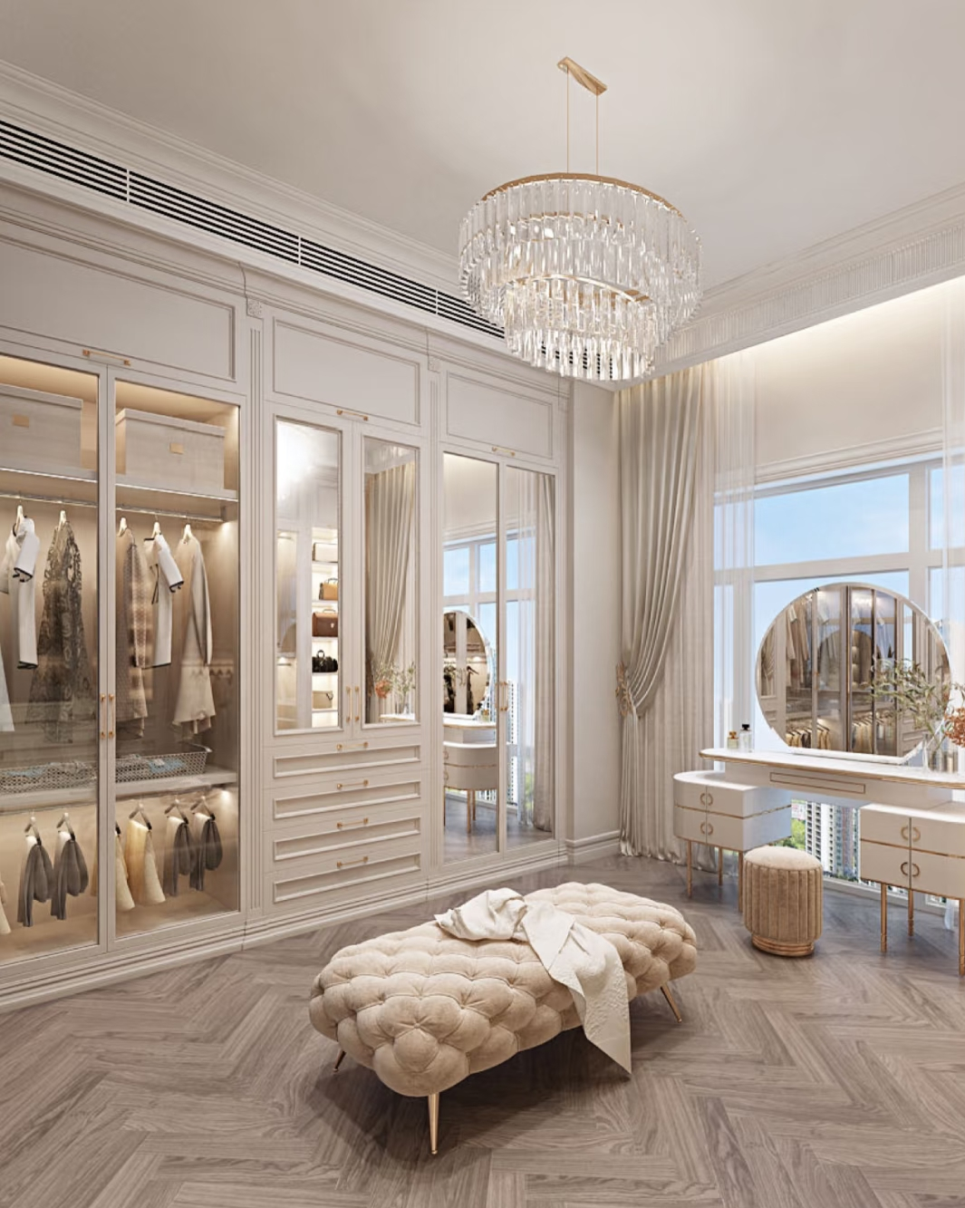 Elegant, bright walk in closet with chandelier and makeup vanity.